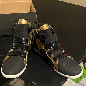 Stylish Black and Gold High-Top Sneakers